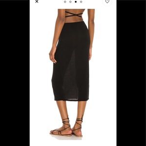 We Wore What cut out jersey midi skirt. NEW WITH TAGS! Cutout detail at hip
